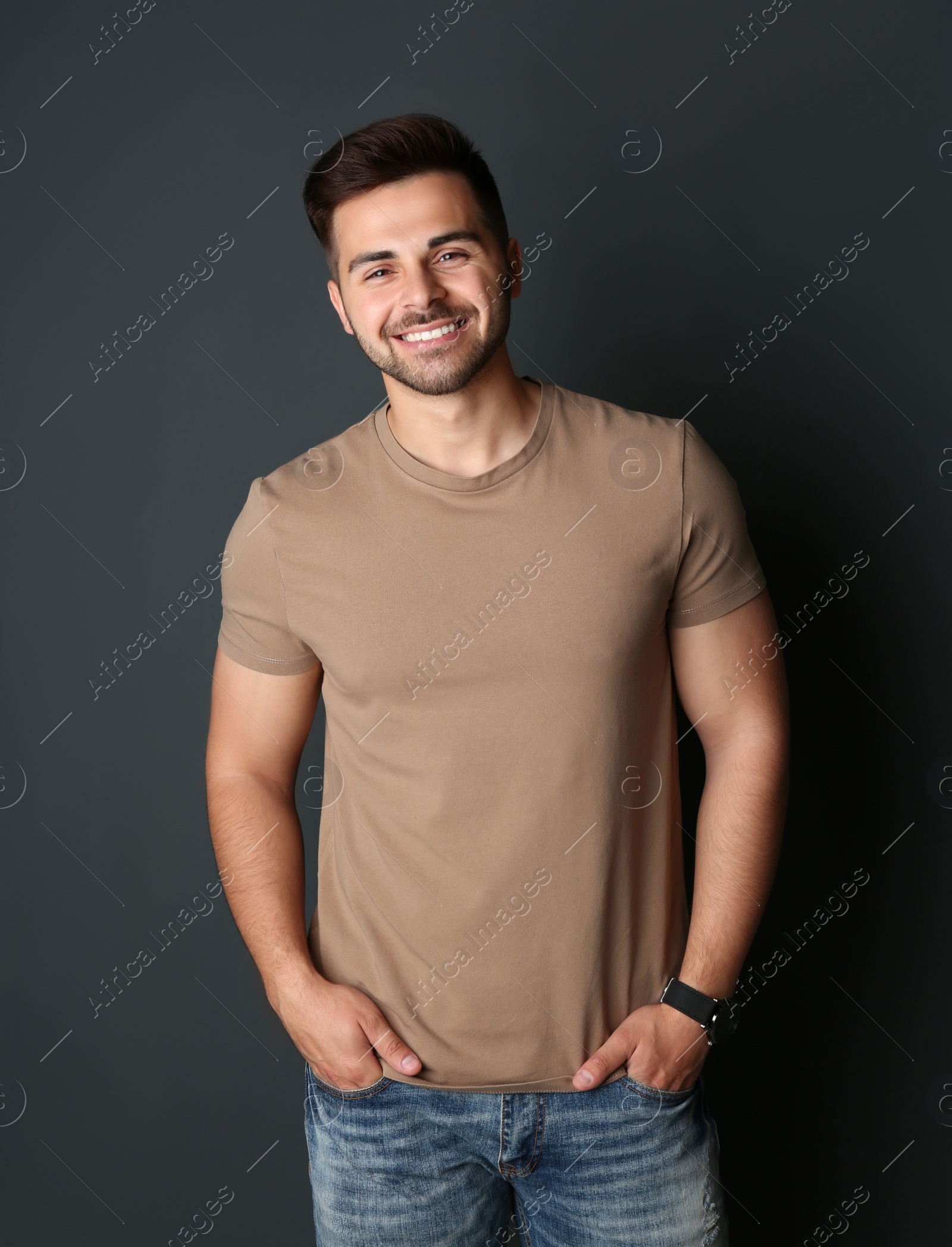 Photo of Portrait of handsome man on dark background