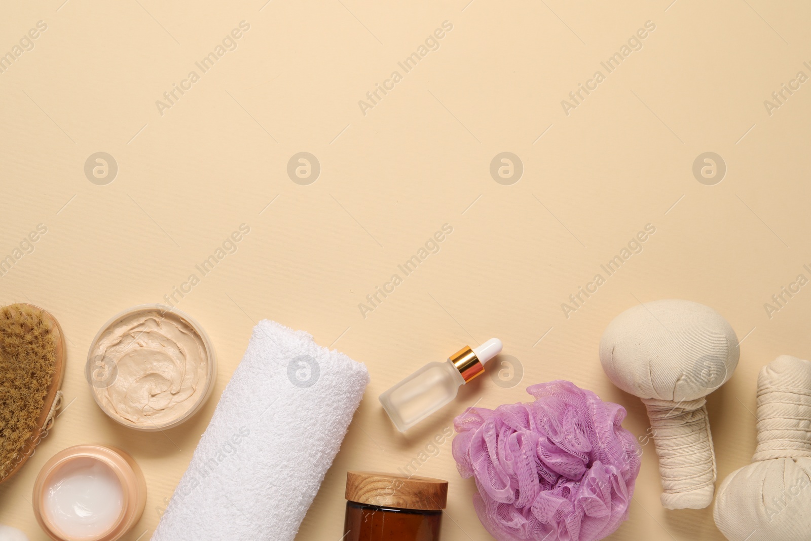 Photo of Bath accessories. Flat lay composition with personal care products on beige background, space for text