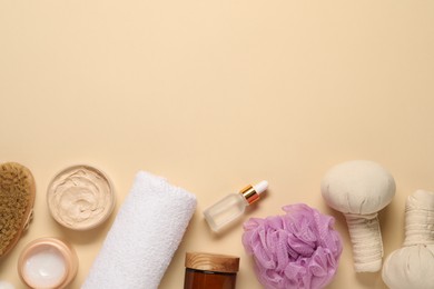 Bath accessories. Flat lay composition with personal care products on beige background, space for text