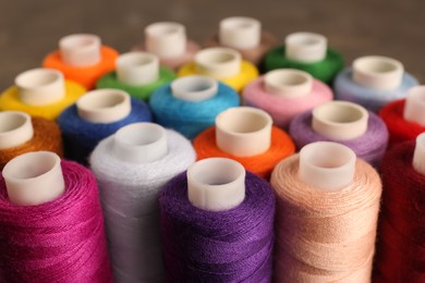 Photo of Set of color sewing threads, closeup view