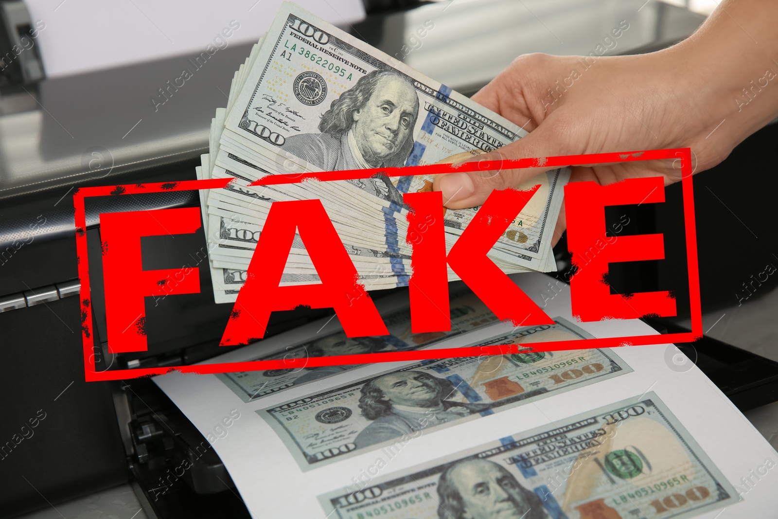 Image of Counterfeiter printing fake dollar banknotes, closeup 