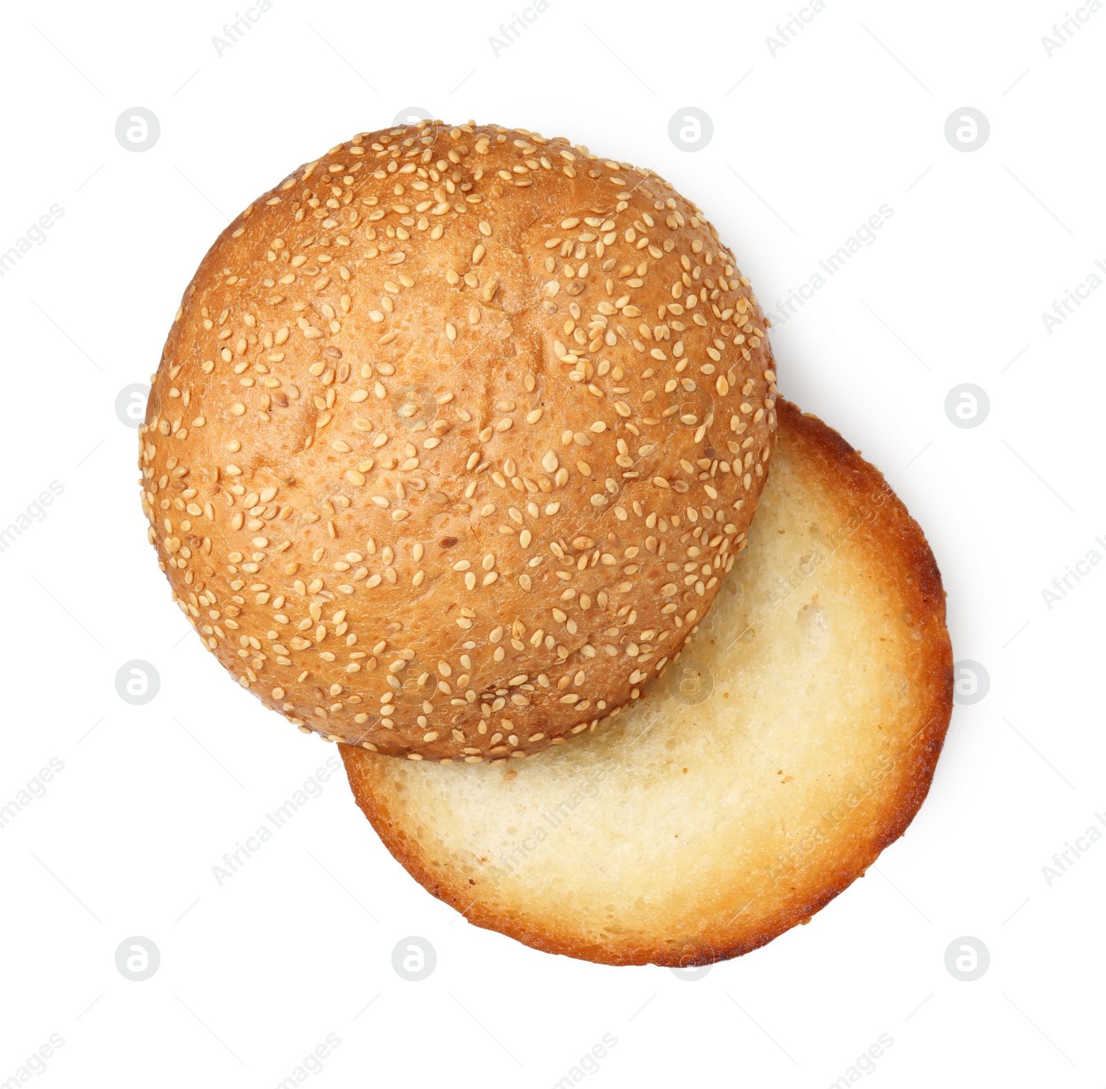 Photo of Halves of grilled burger bun isolated on white, top view