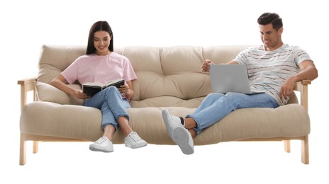 Happy couple resting on comfortable sofa against white background