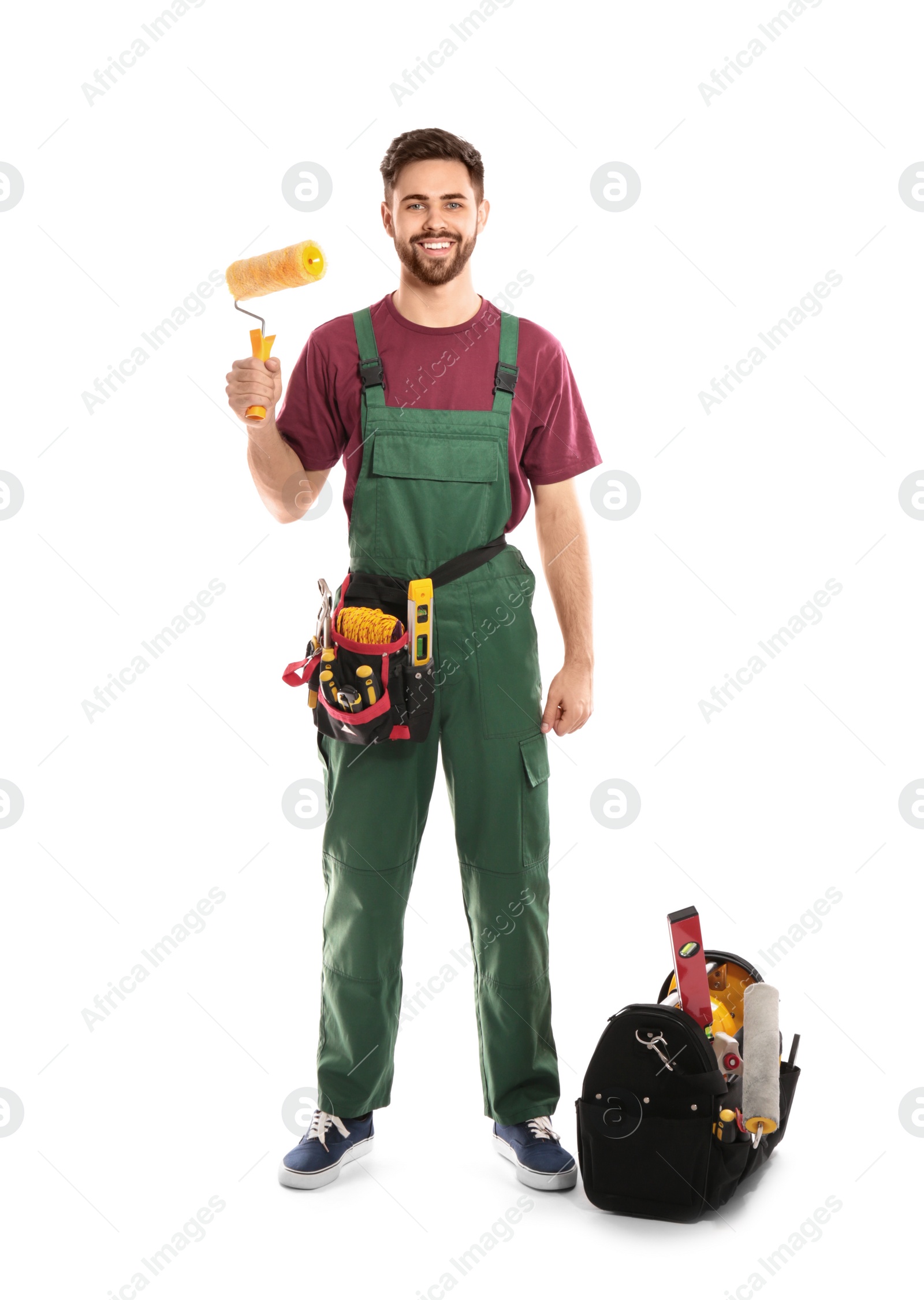 Photo of Full length portrait of professional construction worker with tools on white background