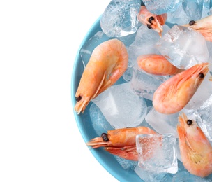 Photo of Bowl with raw shrimps and ice cubes on white background, top view