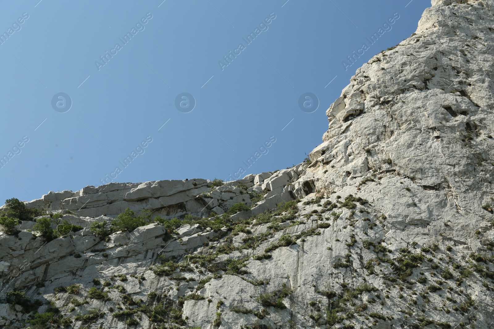 Photo of Picturesque landscape with high mountains under blue sky outdoors