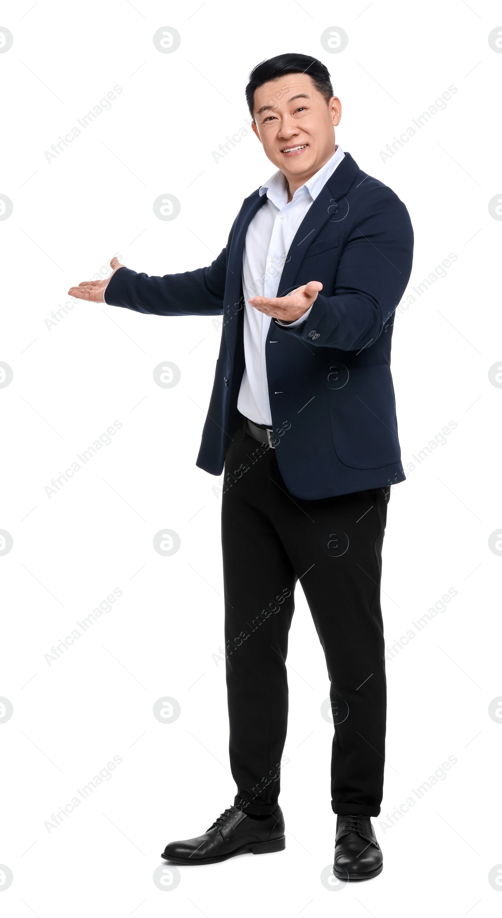 Photo of Businessman in suit posing on white background