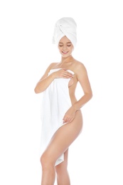 Photo of Portrait of young pretty woman with towels on white background