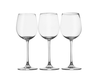 Photo of Set of wine glasses isolated on white