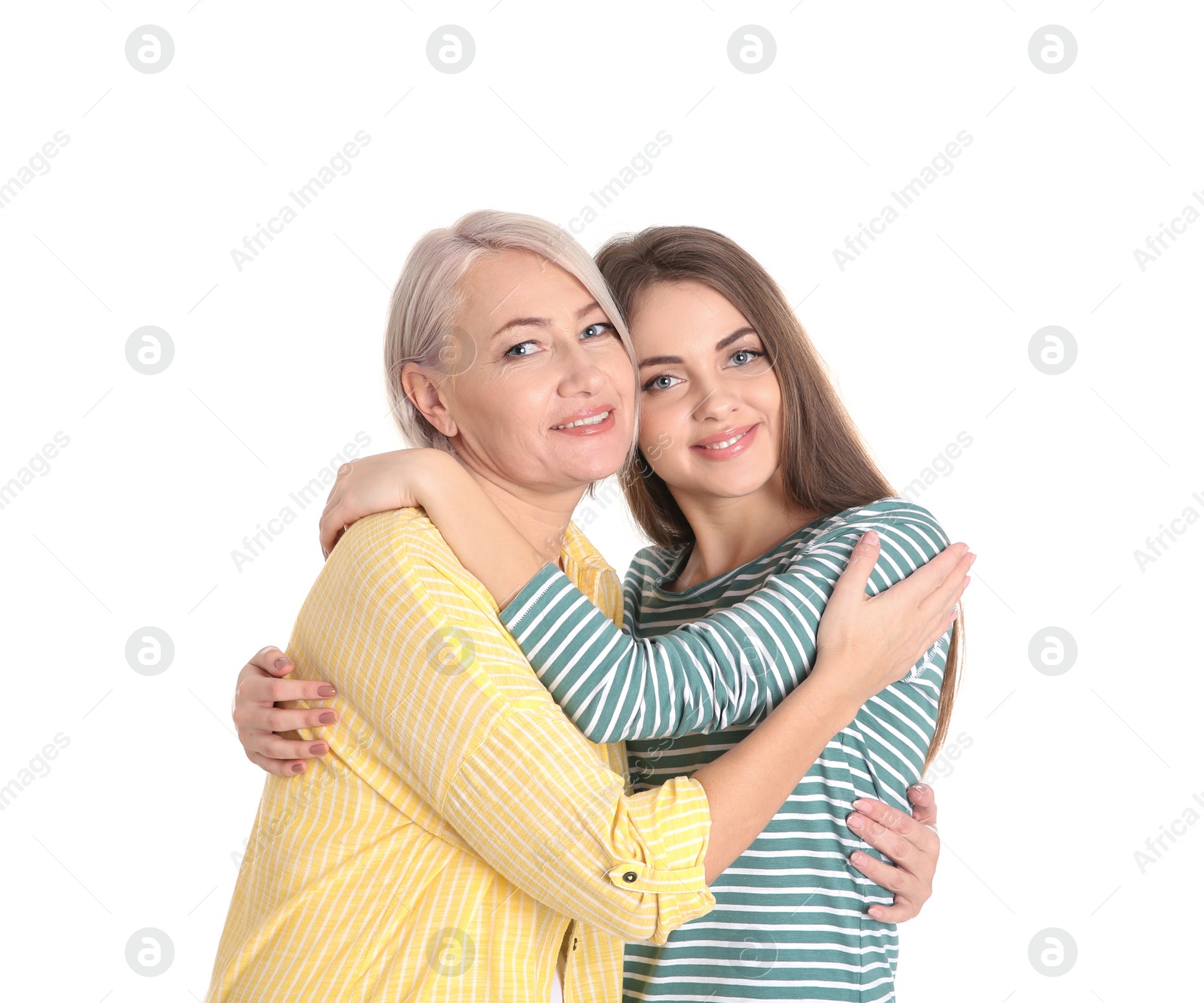 Photo of Portrait of young woman with her mature mother on white background