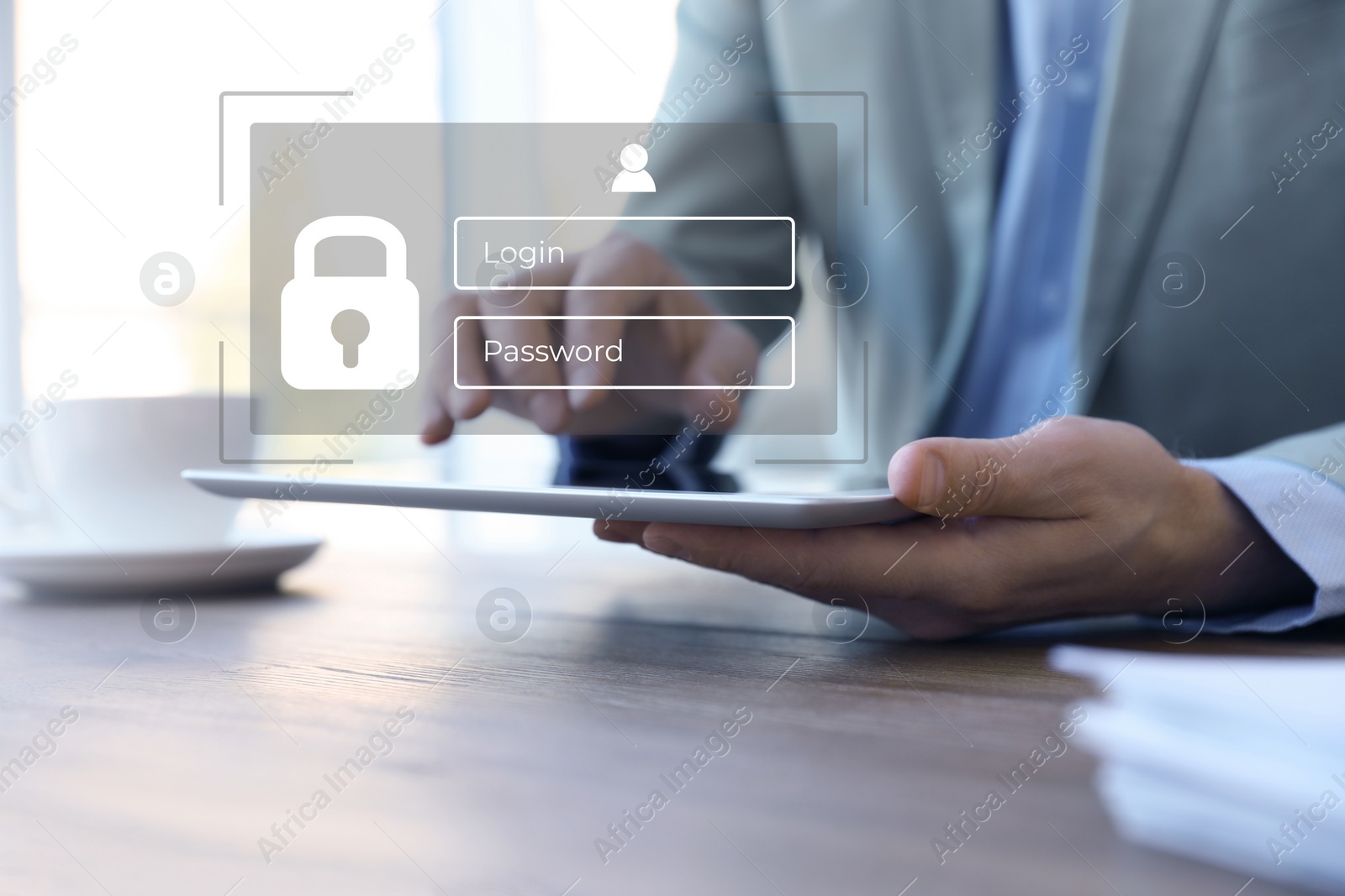 Image of Privacy protection. Man using tablet in office, closeup. Digital login interface over device