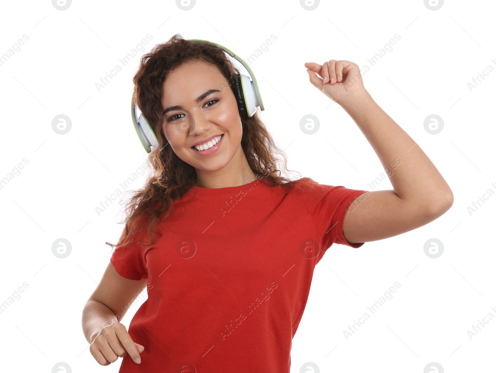 Photo of African-American girl listening to music with headphones on white background