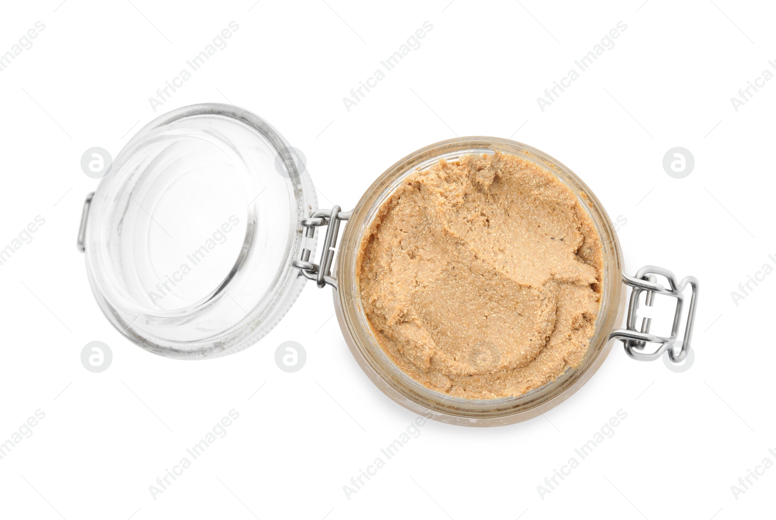 Photo of Delicious meat pate in glass jar isolated on white, top view