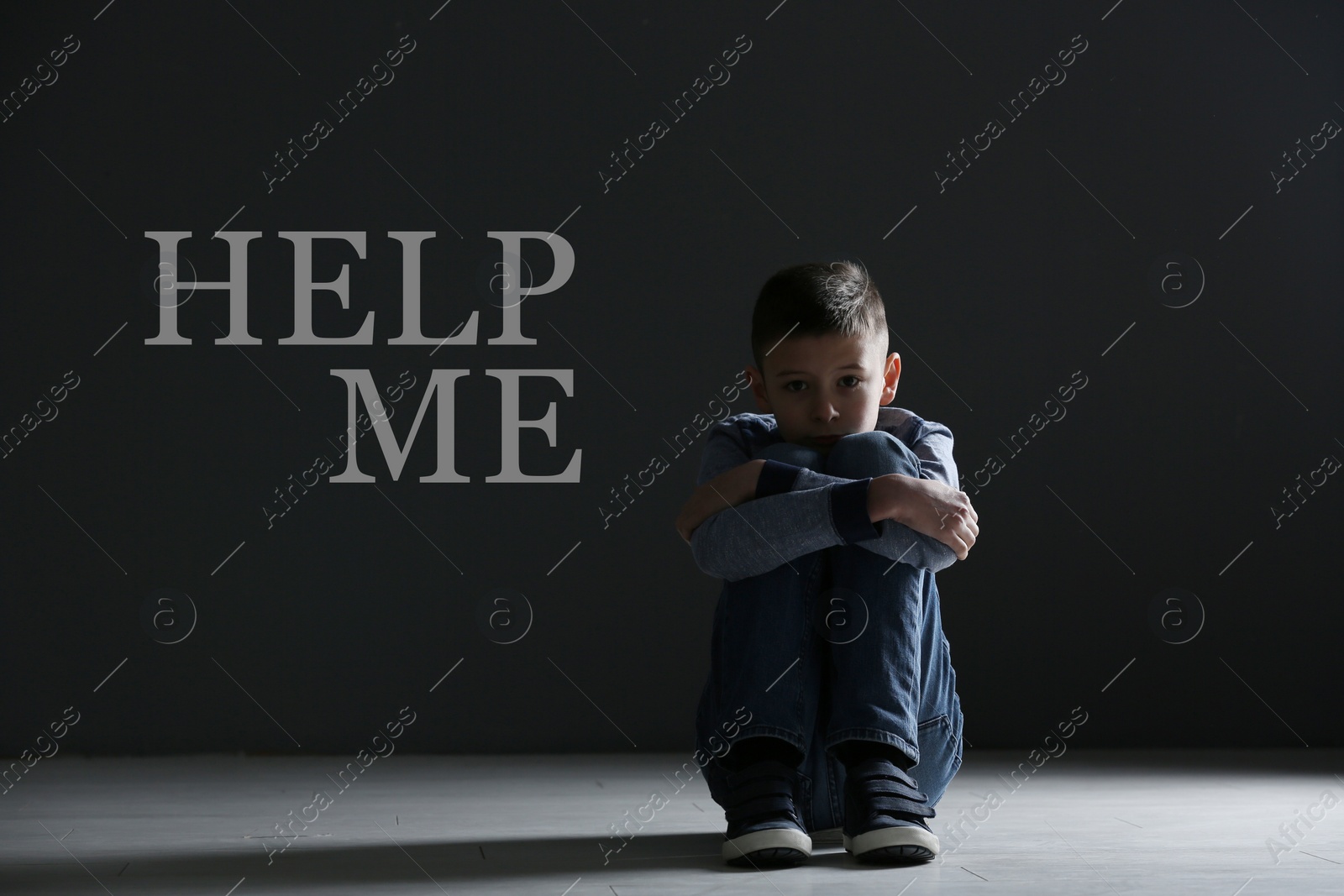 Image of Upset boy in dark room and text HELP ME