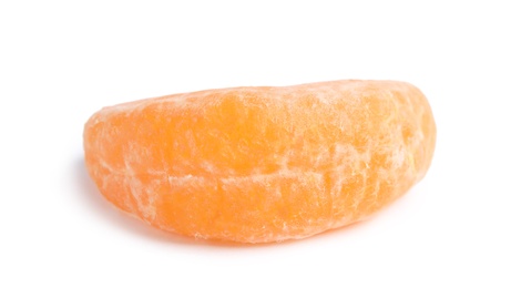 Piece of ripe tangerine on white background