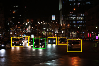 Image of Night city road with scanner frames on cars. Machine learning