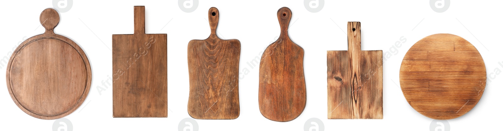 Image of Set with different wooden boards on white background, banner design. Cooking utensils