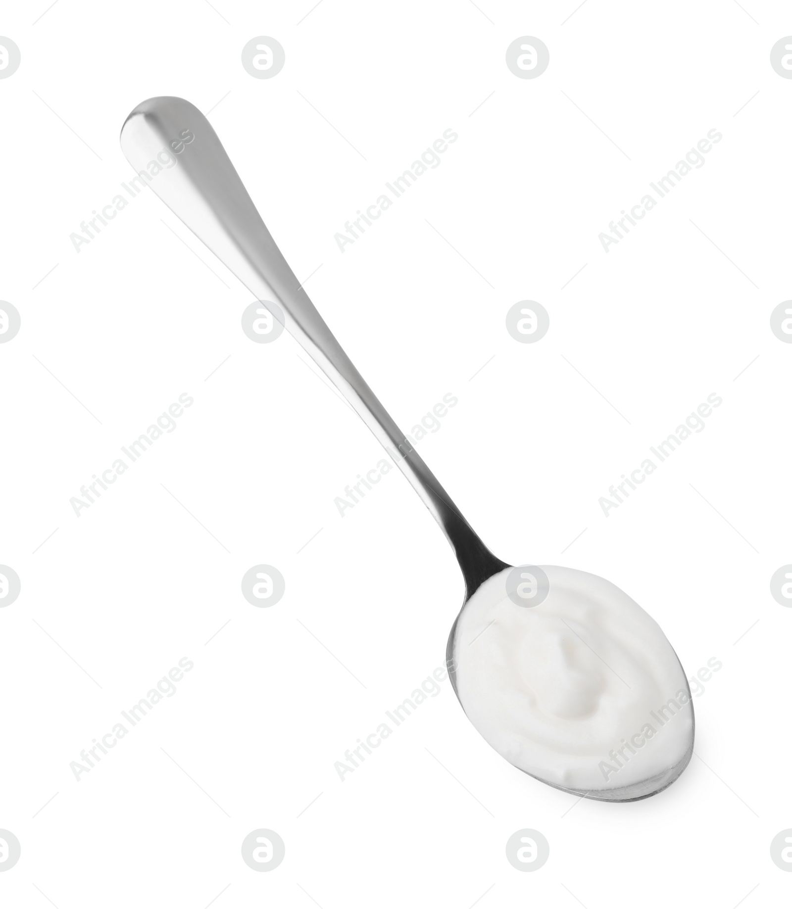 Photo of Delicious natural yogurt in spoon isolated on white, top view