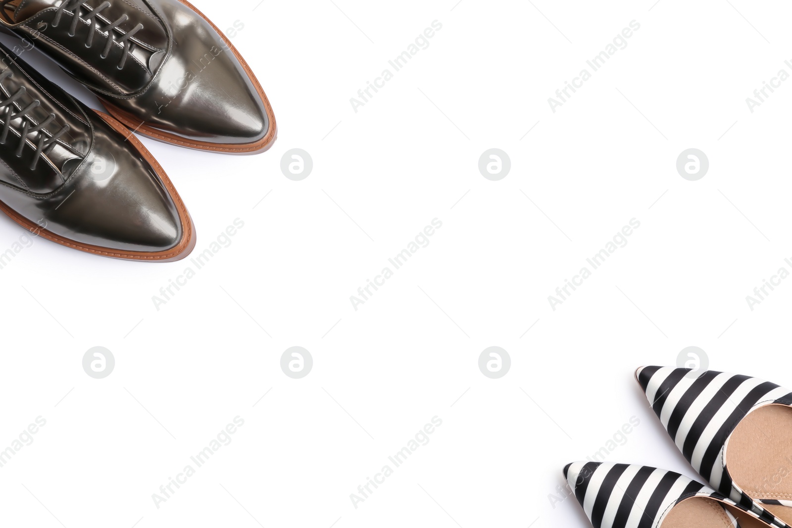 Photo of Stylish shoes on white background, top view