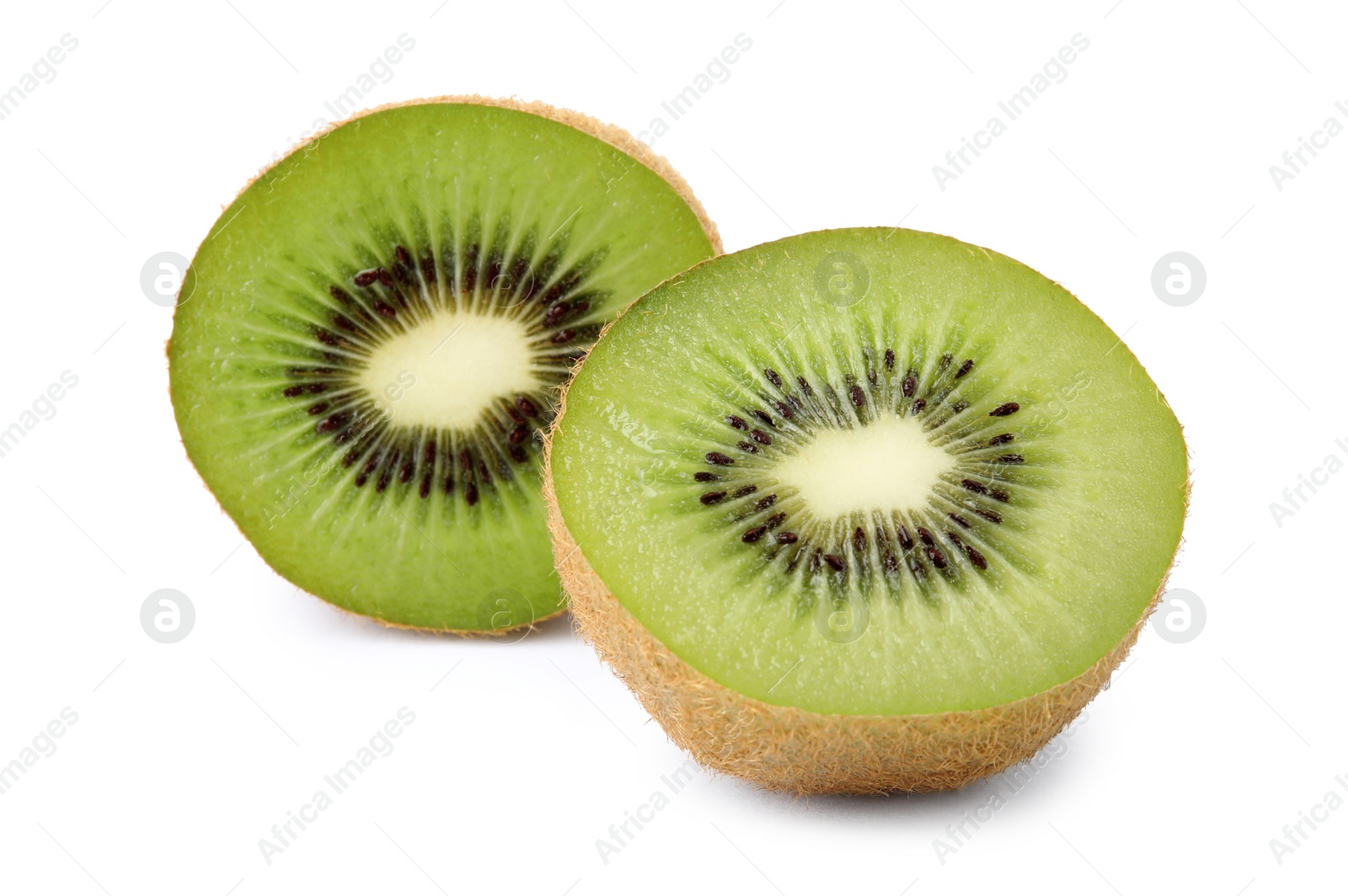 Photo of Halves of fresh kiwi on white background