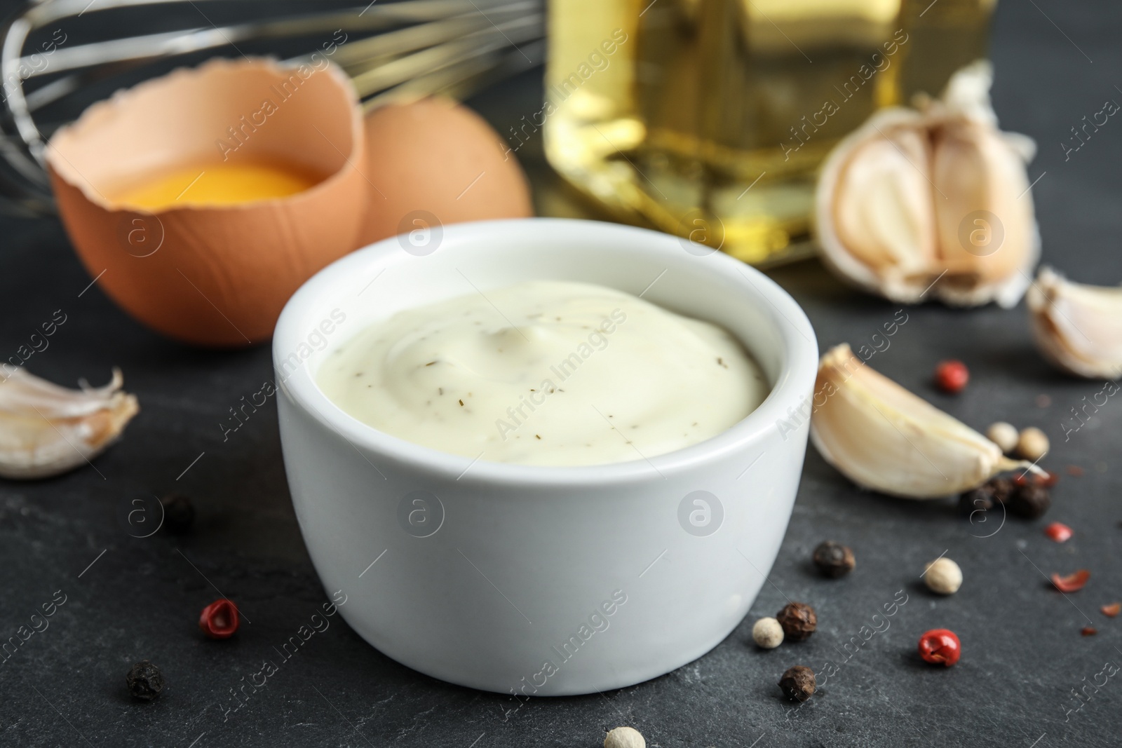 Photo of Bowl of garlic sauce on kitchen table