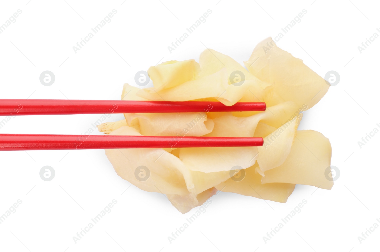 Photo of Chopsticks with pickled ginger on white background, top view