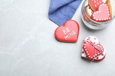 Photo of Delicious heart shaped cookies on light table, flat lay with space for text. Valentine's Day