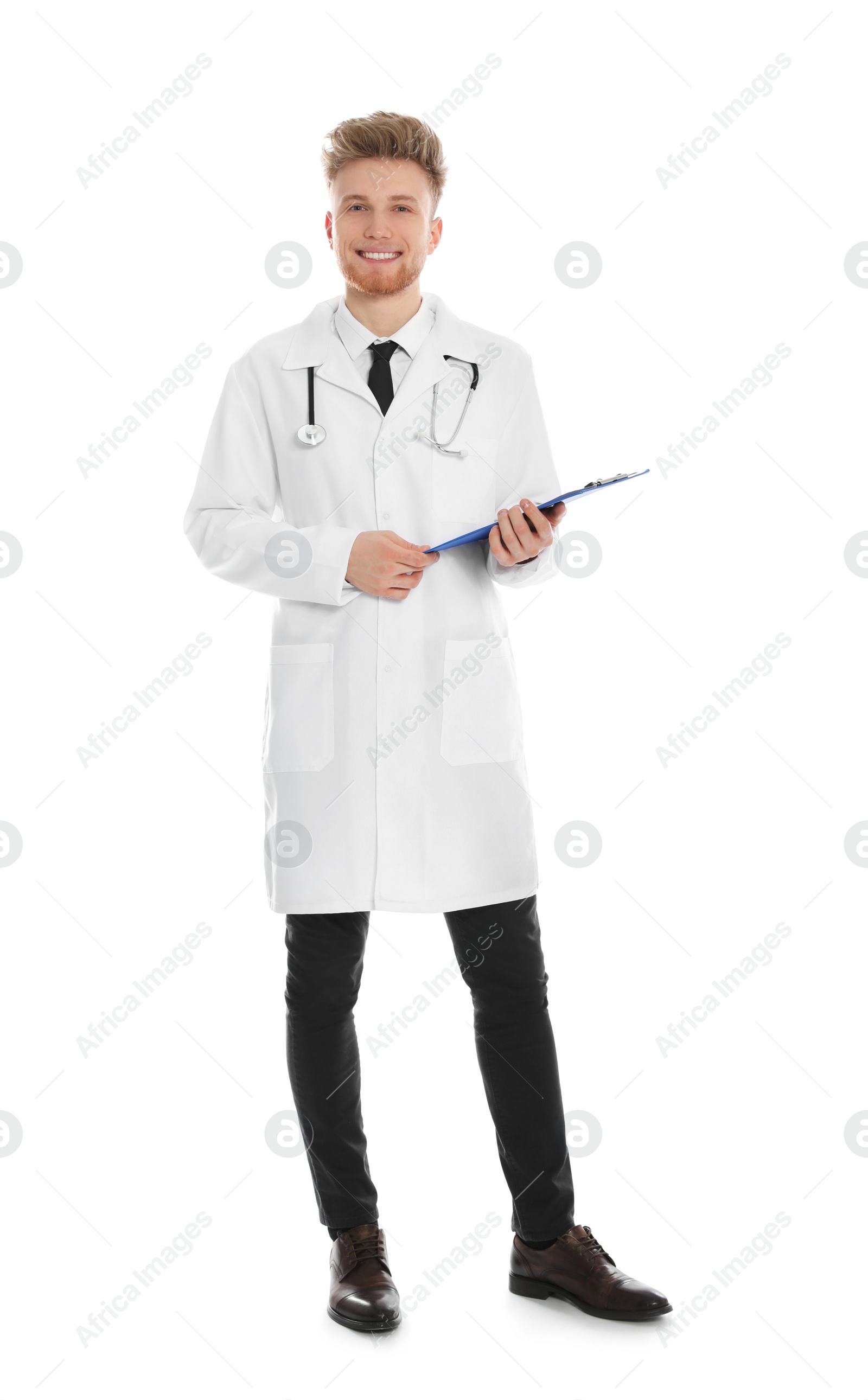 Photo of Full length portrait of medical doctor with clipboard and stethoscope isolated on white