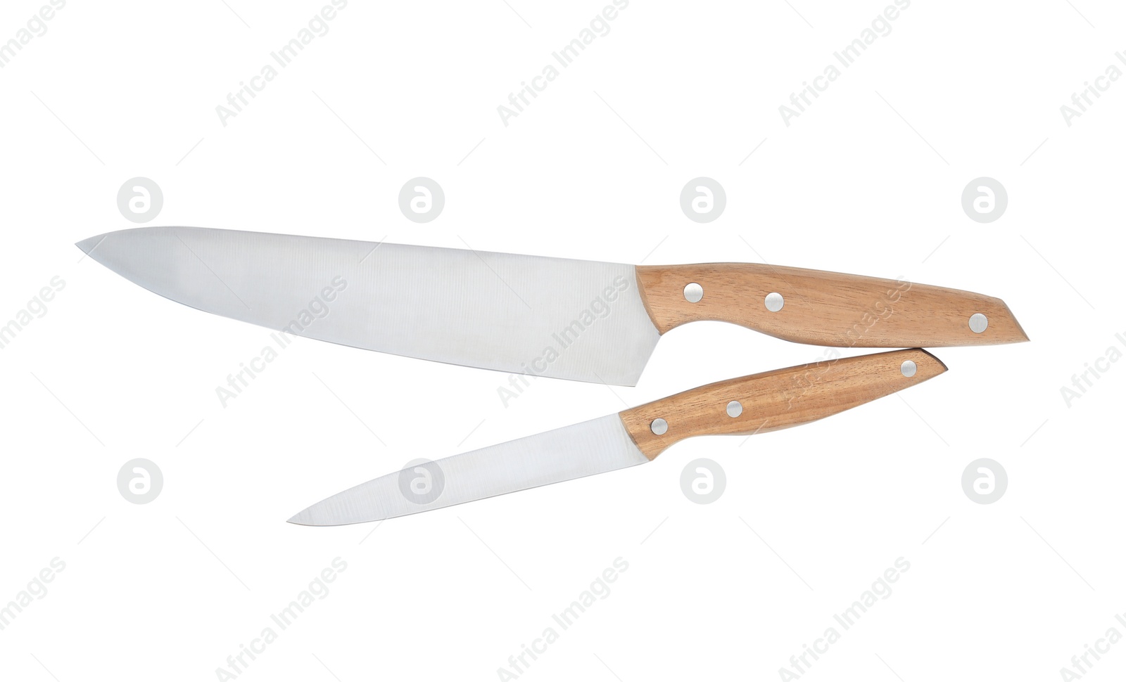 Photo of Stainless steel knives on white background, top view