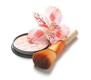 Photo of Face powder with makeup brush and flower on white background