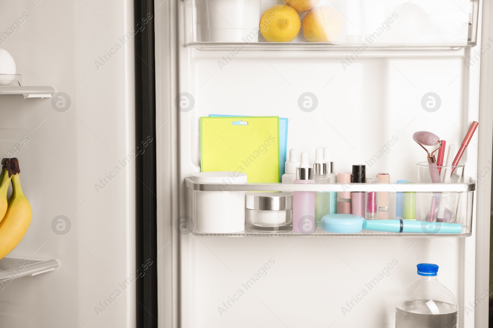 Photo of Storage of cosmetics and tools in refrigerator door bin