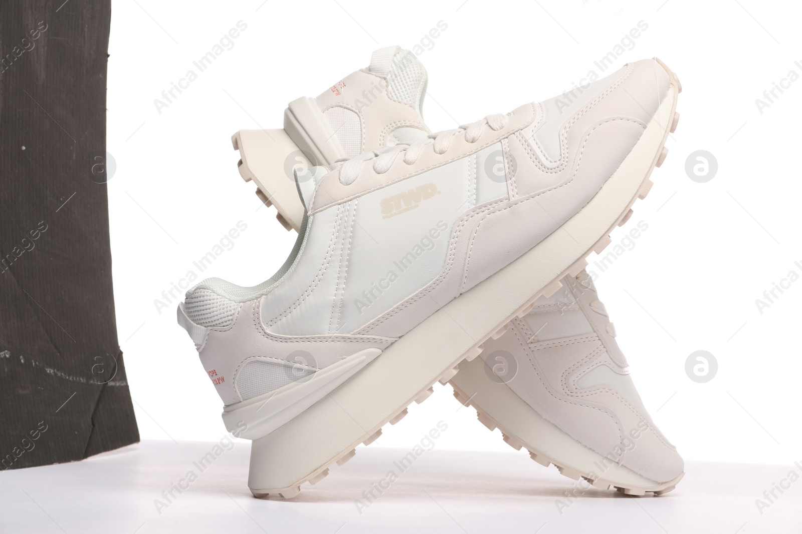 Photo of Pair of stylish sneakers isolated on white