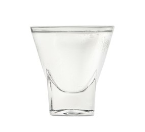 Shot glass of vodka with ice isolated on white