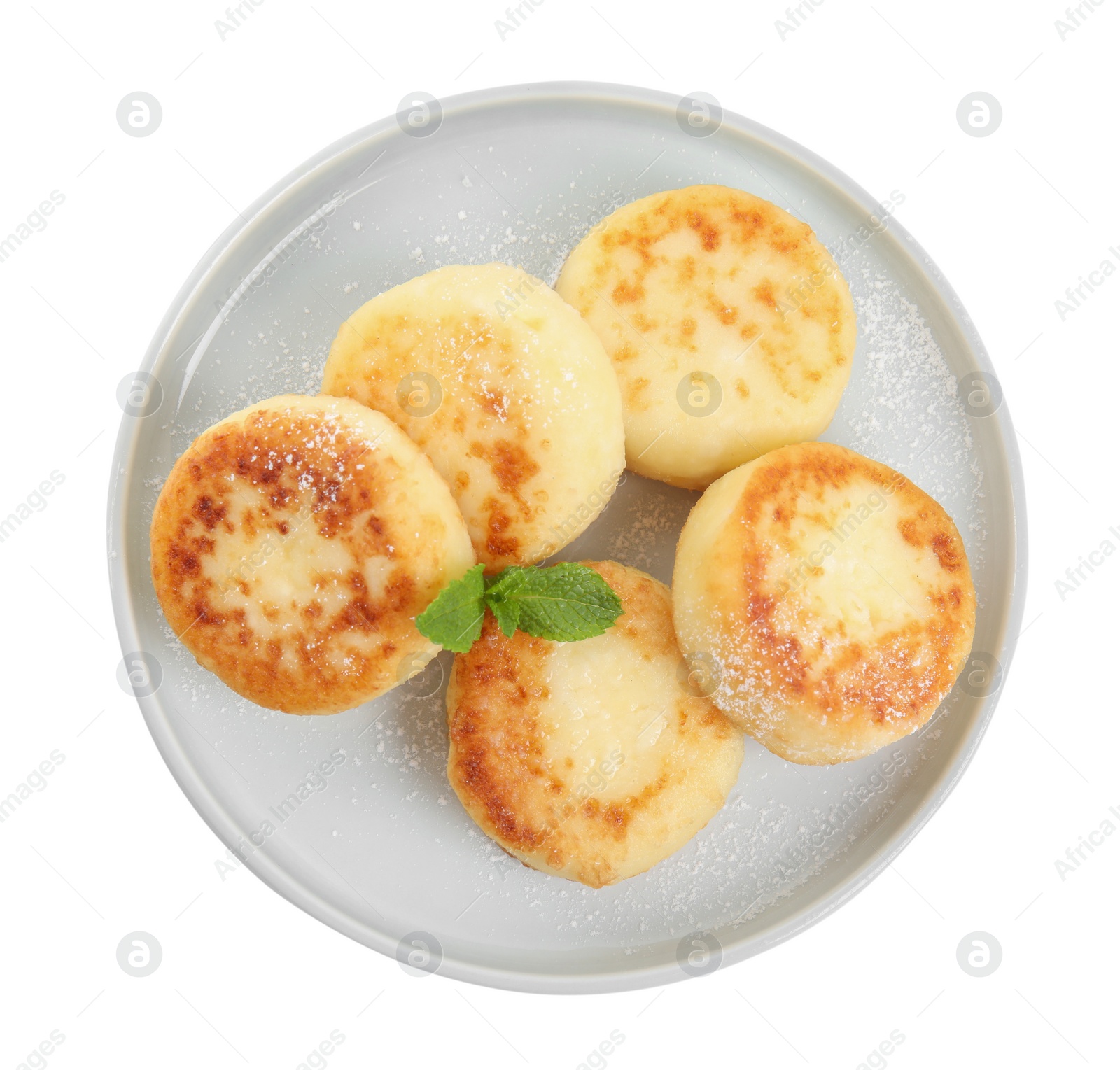 Photo of Delicious cottage cheese pancakes with mint and icing sugar isolated on white, top view