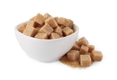 Photo of Bowl and brown sugar cubes on white background