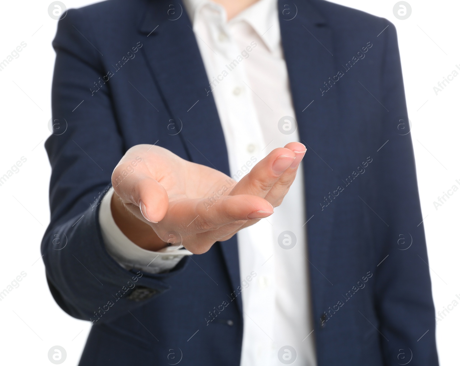 Photo of Young woman against white background, focus on hand