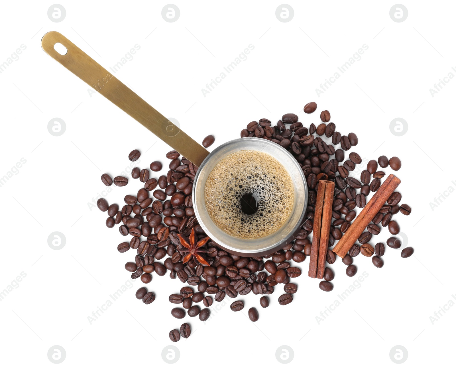 Photo of Hot turkish coffee pot, beans and spices on white background, top view