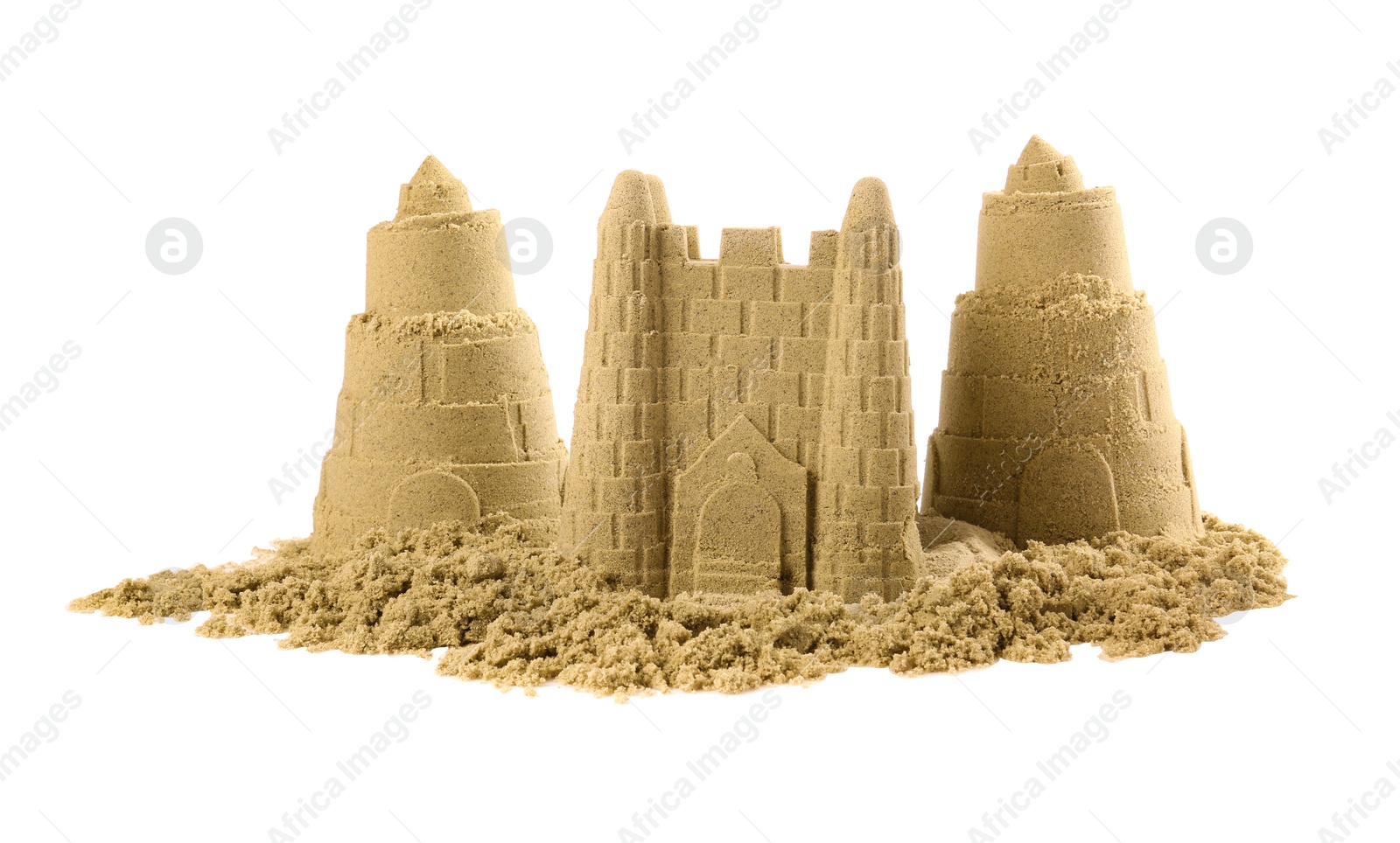 Photo of Pile of sand with beautiful castles isolated on white