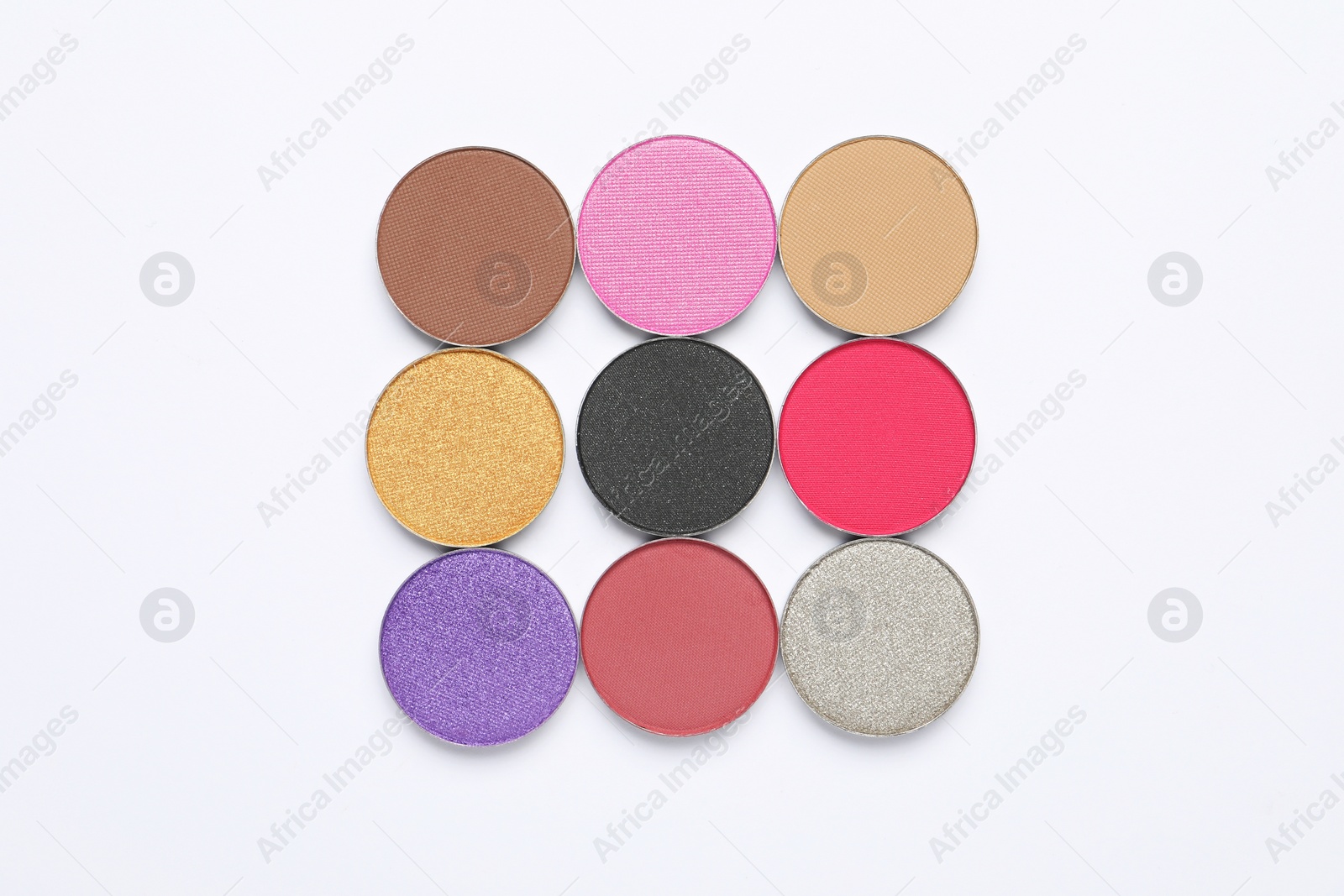 Photo of Beautiful eye shadow refill pans on white background, flat lay