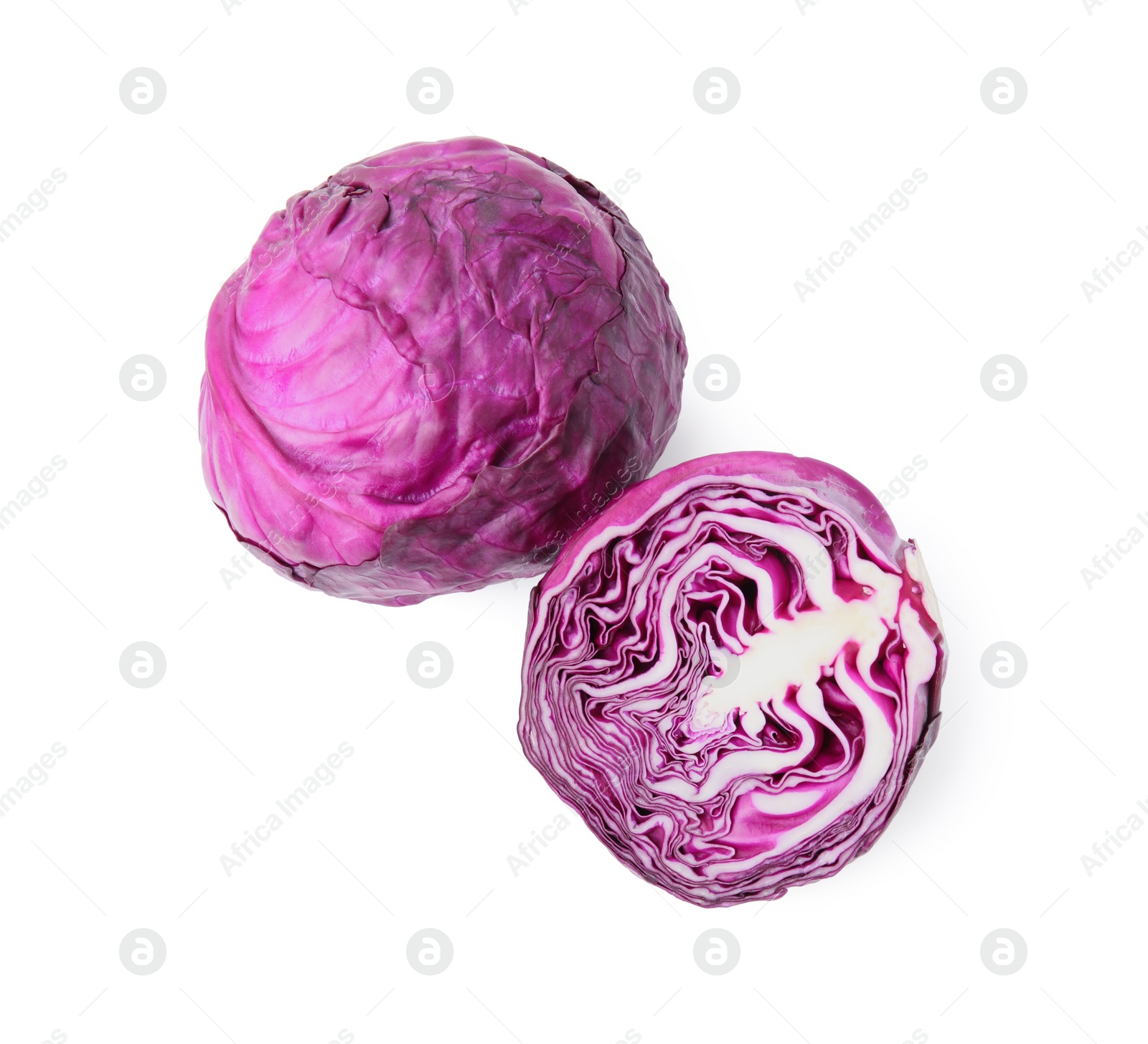 Photo of Whole and cut fresh red cabbages isolated on white, top view