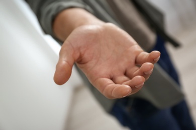 Photo of Man giving hand to somebody, closeup. Help and support concept