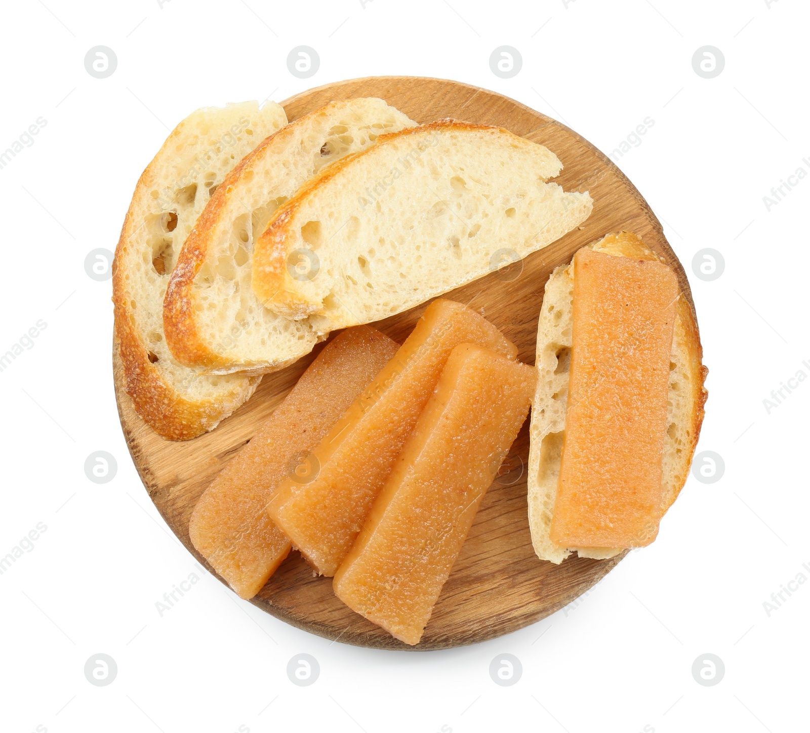 Photo of Delicious sweet quince paste and bread isolated on white, top view