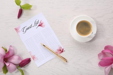 Guest list, coffee, pen and beautiful flowers on white wooden table, flat lay. Space for text