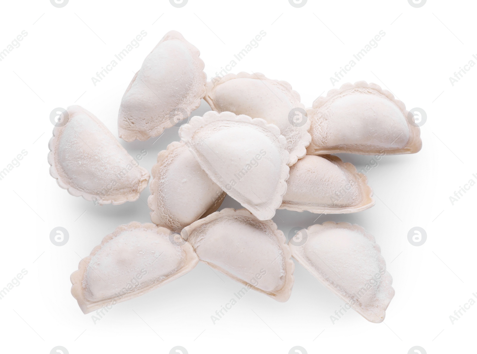 Photo of Pile of raw dumplings (varenyky) on white background, top view