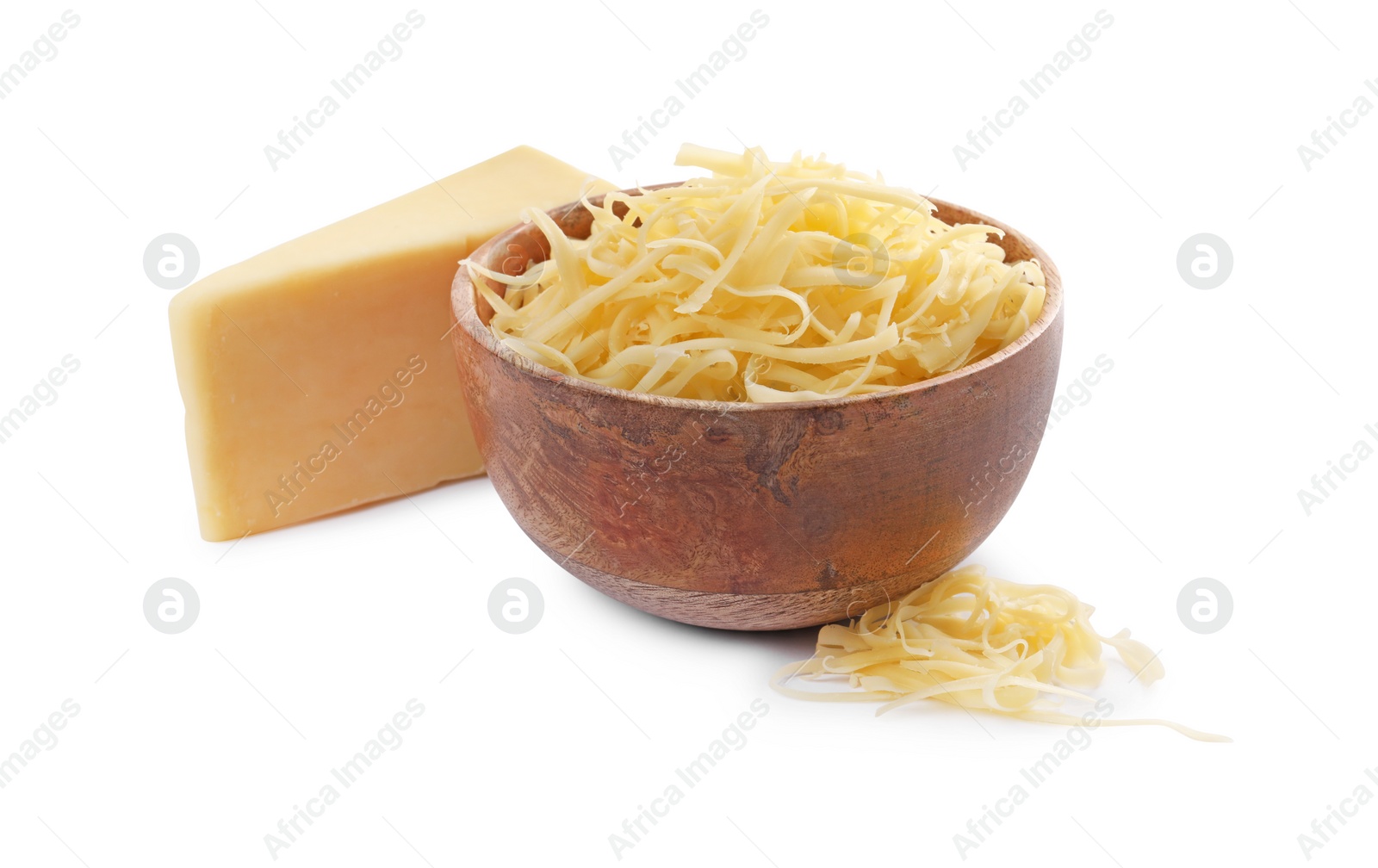 Photo of Grated and whole piece of cheese isolated on white