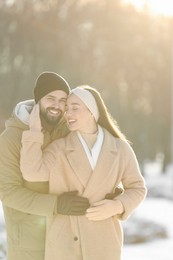 Photo of Beautiful young couple enjoying winter day outdoors