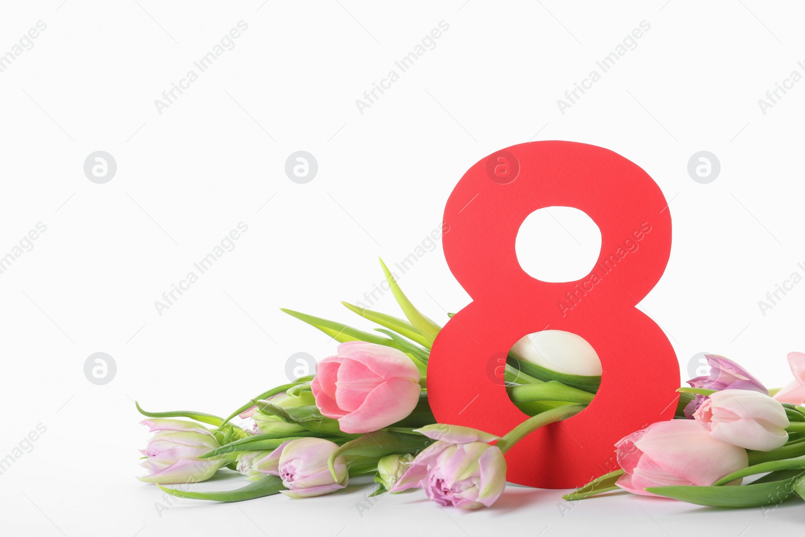 Photo of 8 March card design with tulips on white background. International Women's Day