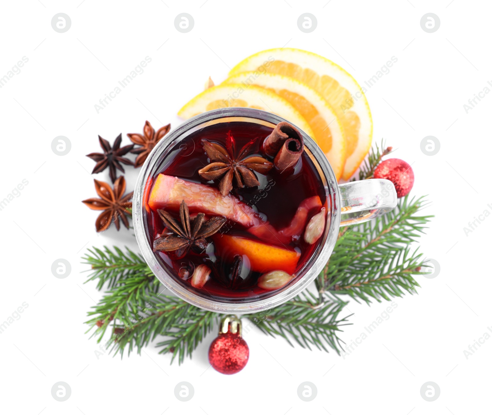 Photo of Aromatic mulled wine, ingredients and decor on white background, top view