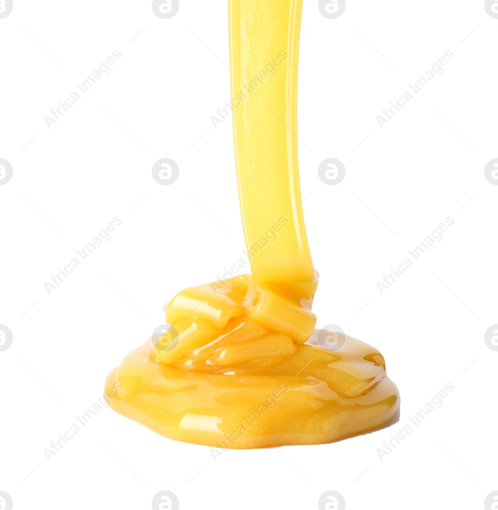 Photo of Pouring fresh sweet honey on white background