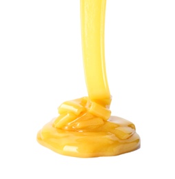 Photo of Pouring fresh sweet honey on white background